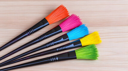 Fototapeta premium Colorful Paintbrushes On Wooden Background