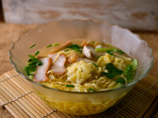 egg noodles with wonton roasted pork and crispy pork.