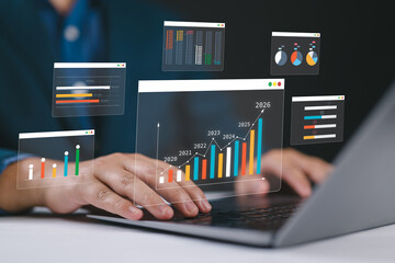 Analyst uses computer with dashboard for data business analysis, Data Management System with KPI...