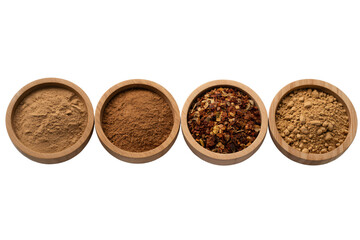 Assorted spices in wooden bowls: cinnamon, cocoa, chili flakes, and ginger powder for cooking recipes