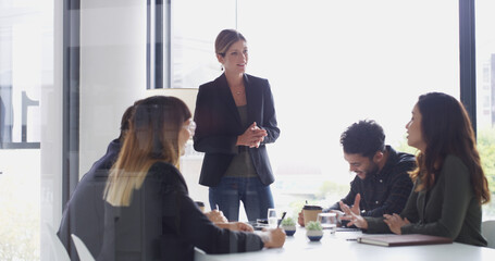 Woman, presentation and meeting with planning in office with agenda, talk and strategy at media...