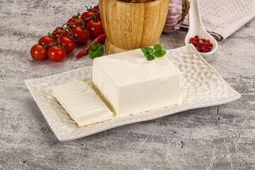 Soft Feta cheese piece with cut