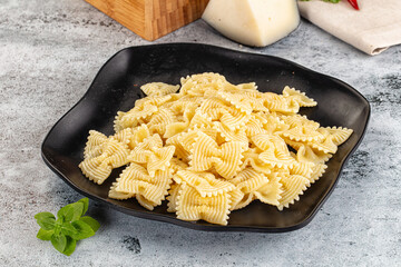 Italian pasta Farfalle with oil