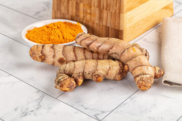 Fresh aroma tumeric roots heap
