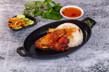 Spicy roasted chicken wing with rice