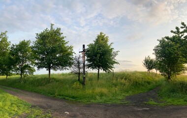 Panoramic morning view of the Czech countryside in the Opava region of Silesia on a sunny spring day.