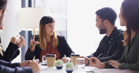 Business, people and planning with discussion in boardroom for press release, strategy or ideas. Creative agency, publicist or teamwork with meeting for brand management, public relations or proposal