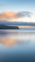 Serene coastal sunrise reflection