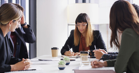 Collaboration, planning and writing with business people in boardroom for development or discussion. Corporate, meeting and teamwork with notes auditor group in office for professional workshop