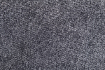 Fototapeta premium background of gray denim fabric close up