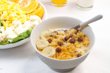 Colorful top-view bowl of fresh fruit, oats, and seeds showcasing a healthy, organic, vegan breakfast rich in vitamins and fiber.