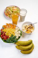 Colorful top-view bowl of fresh fruit, oats, and seeds showcasing a healthy, organic, vegan breakfast rich in vitamins and fiber.