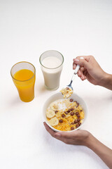 Colorful top-view bowl of fresh fruit, oats, and seeds showcasing a healthy, organic, vegan breakfast rich in vitamins and fiber.