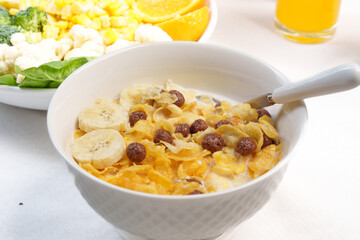 Colorful top-view bowl of fresh fruit, oats, and seeds showcasing a healthy, organic, vegan breakfast rich in vitamins and fiber.