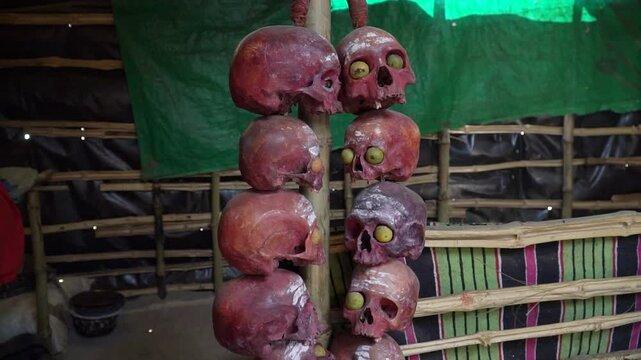 Aghori post-mortem ceremony ritual skulls inside aghori shelter, Varanasi