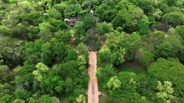 Beng mealea temple surrounded by lush green jungle in cambodia, aerial view
