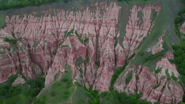 Aerial view of the pink mountain Rapa Rosie in Romania.