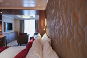 Luxurious mini suite stateroom cabin room onboard luxury cruise ship cruiseship ocean liner with...