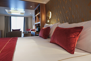 Luxurious mini suite stateroom cabin room onboard luxury cruise ship cruiseship ocean liner with...