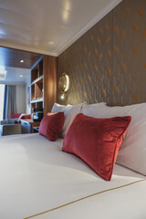 Luxurious mini suite stateroom cabin room onboard luxury cruise ship cruiseship ocean liner with...