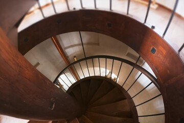 Fototapeta premium Spiral staircase in an old building,