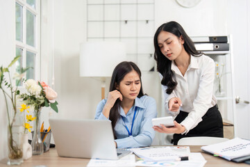 Guiding Colleague Through Challenges. Businesswoman providing direction to her stressed colleague in the office.