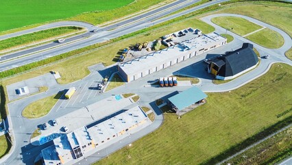 Industrial complex with adjacent roads, aerial shot