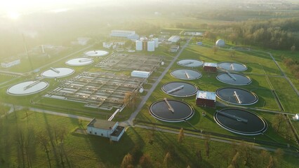 Circular wastewater tanks at industrial facility