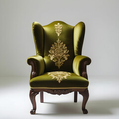 A traditional wingback armchair in olive green upholstery with classic wooden legs.