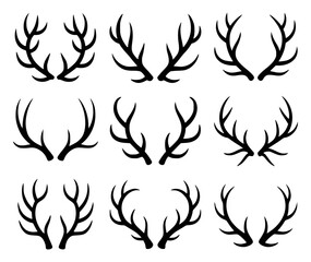 Collection of black silhouette deer antler horns on white background