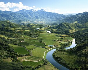 A lush green valley with terraced fields and a winding river, surrounded by forested hills and distant mountains under a partly cloudy sky.