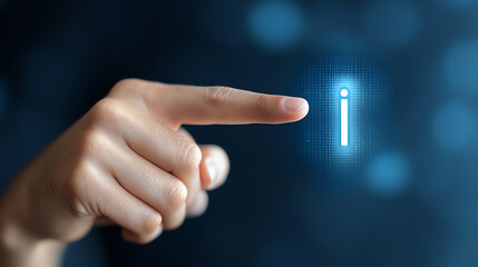 A hand pointing at a glowing information icon on a digital screen, symbolizing technology and knowledge sharing.