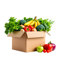 A cardboard box filled with fresh produce including bananas, broccoli and lettuce