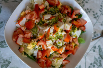 summer salad with surimi lettuce and vegetables