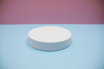 Podium display scene stage showcase front view with copy space on pink and blue background