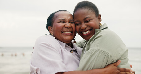 Smile, mother and daughter with hug on beach for travel, summer holiday and getaway. African family, laugh and embrace with mature woman, tropical vacation and bonding together for affection on trip