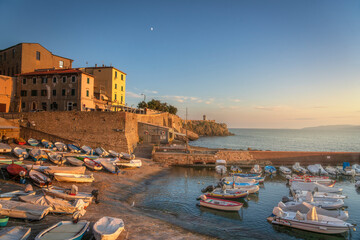 Sunset over Piombino seafront. Tuscany, Italy