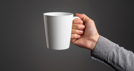 Obraz premium hand holding a cup