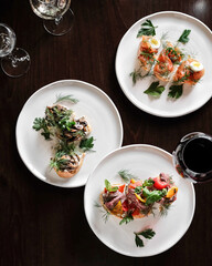 Indulge in Exquisite Gourmet Appetizers served on Elegant Plates paired