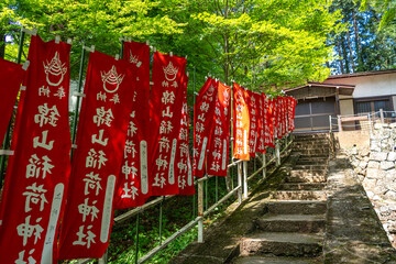 Red flags at Nishikiyama Shrine in Takayama, Japan