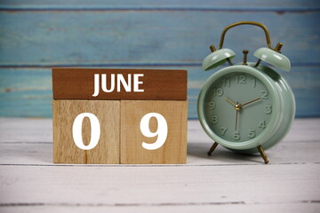 Wooden Calendar Showing the Date of June 9th. Day 9 of June Month