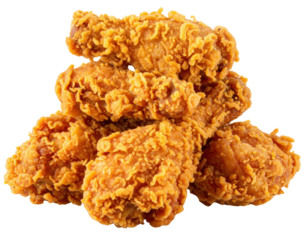 A pile of crispy golden fried chicken pieces stacked together.