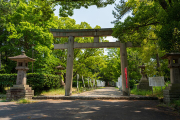 Wakayama City, Japan , June 1 2025 : The stone monument and torii gate at the entrance to Wakayama Prefecture Gokoku Shrine, located within Wakayama Castle.