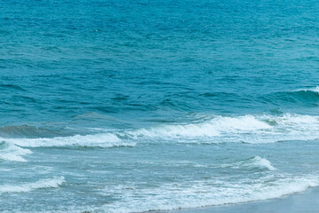 The blue sea on the beach