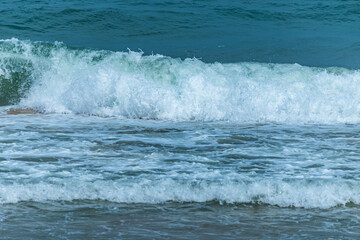 The blue sea on the beach