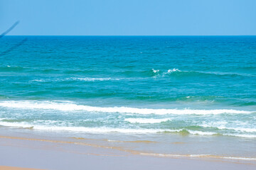 The blue sea on the beach