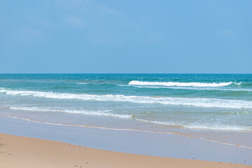 The blue sea on the beach
