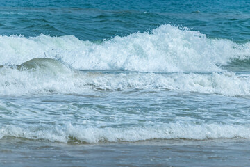 The blue sea on the beach