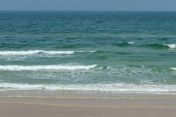 The blue sea on the beach