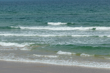 The blue sea on the beach